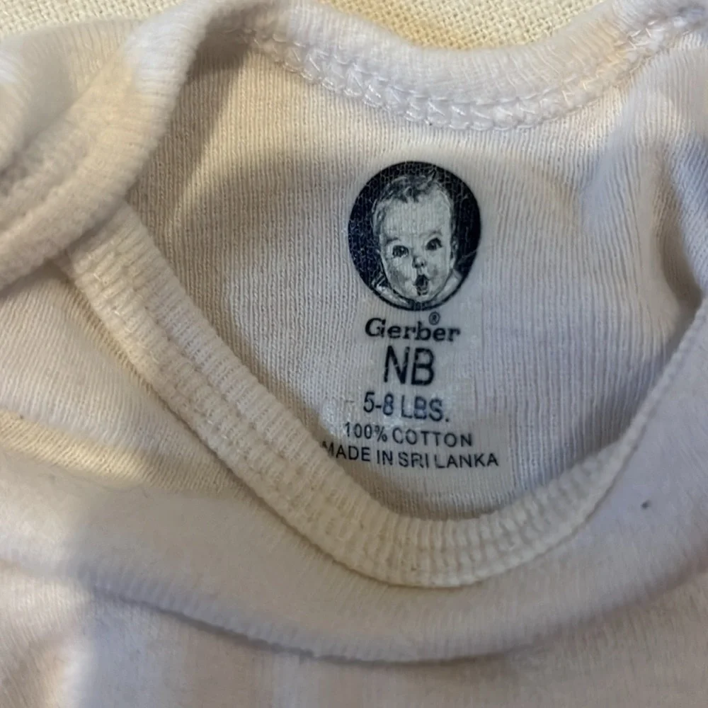Assorted White Newborn Onesies